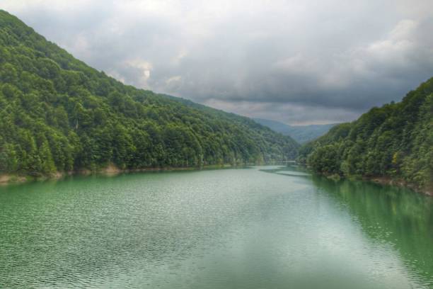 istock Scenic view of a mountain lake 1201760617