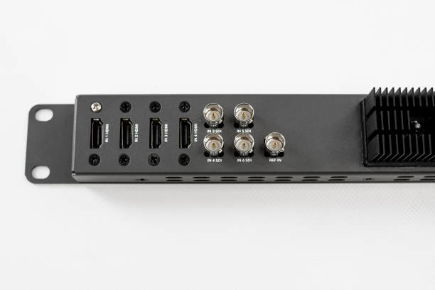 Input lines for hdmi or sdi line cameras in a switcher device for a television production television switch device for realization with hdmi and sdi connections next to heatsink channel input stock pictures, royalty-free photos & images