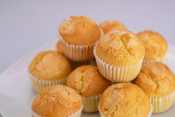 istock A heap of golden muffins covered with white sugar 1201762706