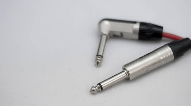 istock A pair of jack metallic connectors, mono type, for musical instruments lines and audio devices. 1201765914