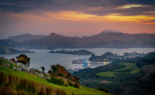 Evening sunset hues over Otago harbour, Port Chalmers and Peninsula