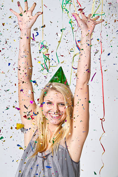istock Young woman celebrating at a party 120178056