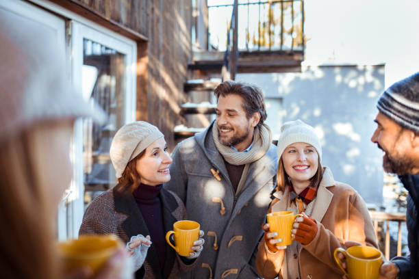 istock Friends Enjoying Mulled Wine 1201783463