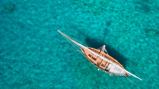 Vintage classic wooden sail boat, Vis Island, Croatia, aerial view