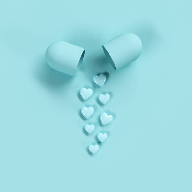 istock Pills heart concept idea on green color background. Minimal valentine ideas. 3D Render. 1201787847