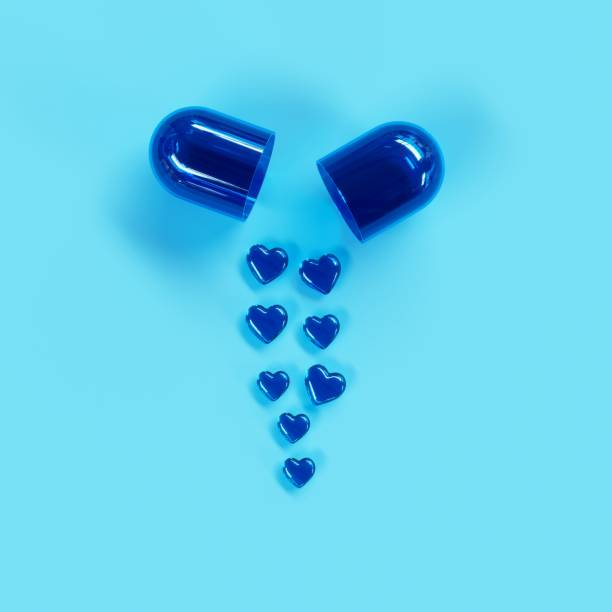 istock Blue Pills heart concept idea on blue color background. Minimal valentine ideas. 3D Render. 1201788420