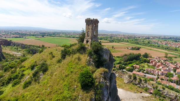 istock Tower surrounded by hills, aerial view 1201795495