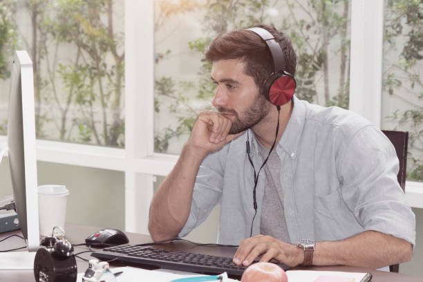 istock Caucasian man with casual costume work at private place 1201804665