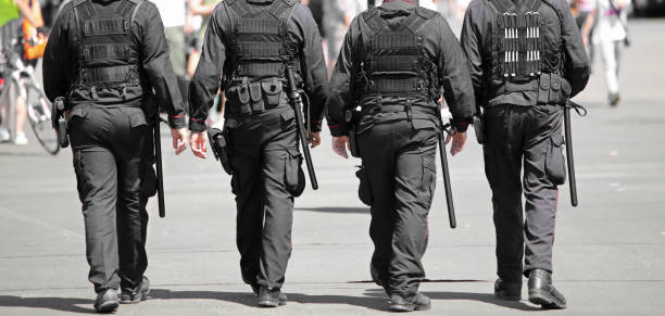 istock policemen in riot gear during a demonstration 1201805546