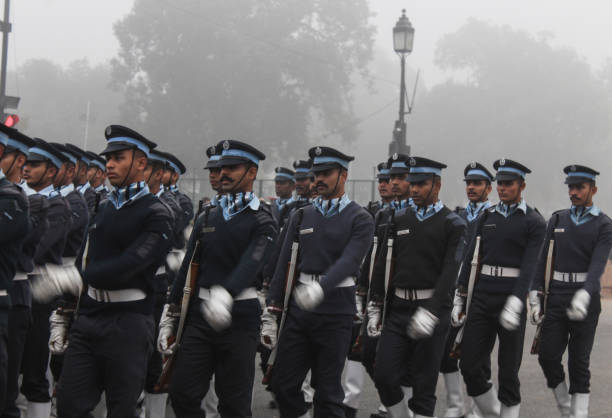 Republic Day rehearsal at Rajpath and India Gate. New Delhi, India - January 25 2020: Republic Day rehearsal at Rajpath and India Gate. Fully uniformed men and women doing march past. indian navy stock pictures, royalty-free photos & images