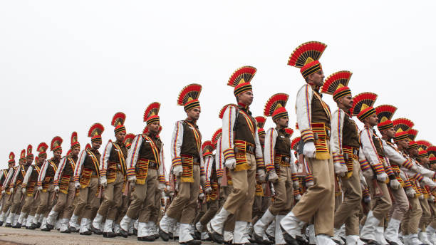 Republic Day rehearsal at Rajpath and India Gate. New Delhi, India - January 25 2020: Republic Day rehearsal at Rajpath and India Gate. Fully uniformed men and women doing march past. indian navy stock pictures, royalty-free photos & images