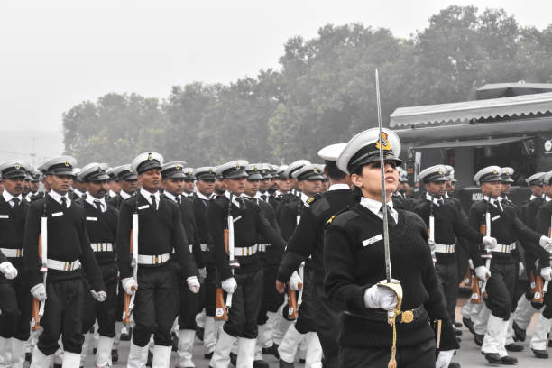 Republic Day rehearsal at Rajpath and India Gate. New Delhi, India - January 25 2020: Republic Day rehearsal at Rajpath and India Gate. Fully uniformed men and women doing march past. indian navy stock pictures, royalty-free photos & images