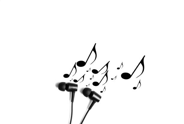 Earphones with notes. Modern music concept. Audio technology.