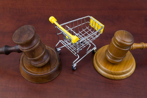 istock Two judge gaves and shopping cart 1201817823