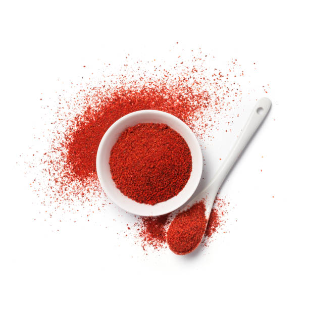 top view of red pepper powder in bowl - paprika imagens e fotografias de stock