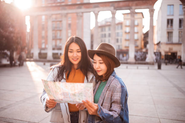 istock Two friends visiting Italy. 1201826951