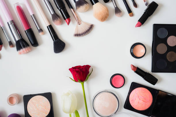 istock Make up concept: Professional makeup tools and accessories. Lipstick, mascara, nail polish, eyeshadow, powder, eyelash and foundation. Top view. 1201827517