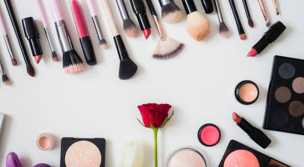 istock Make up concept: Professional makeup tools and accessories. Lipstick, mascara, nail polish, eyeshadow, powder, eyelash and foundation. Top view. 1201827558