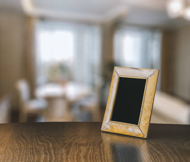 istock photo frame on table in the room 1201830518