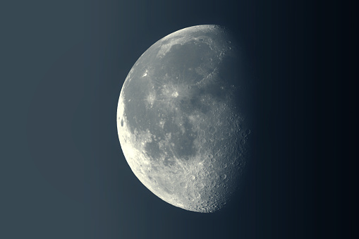Waning gibbous Moon phase in a dark hue