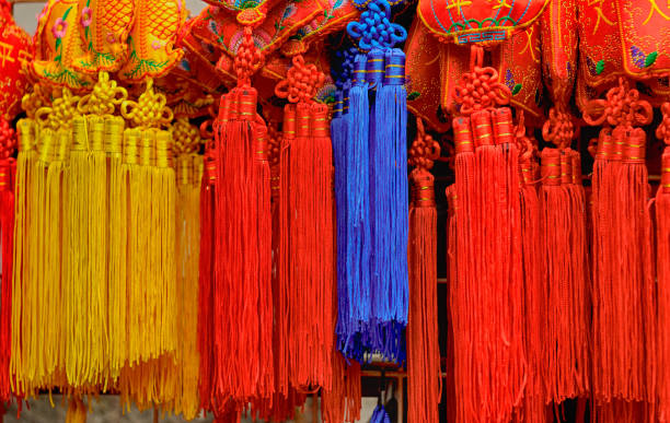 istock Chinese colorful knots hanging in row 1201832805