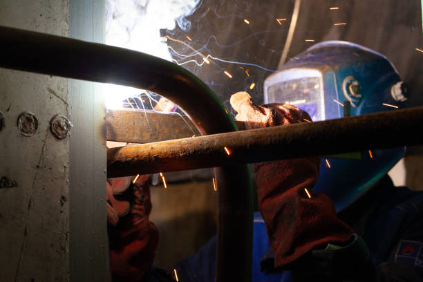 istock Electric welding works in a dark room 1201832883