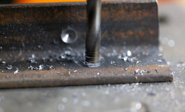 istock Drilling a hole in metal 1201832908
