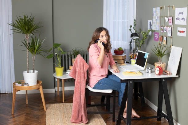 istock Young woman working at home 1201833110