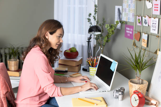 istock Young woman working at home 1201833140