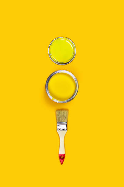 istock Colored background with paint jar and brush. 1201833396
