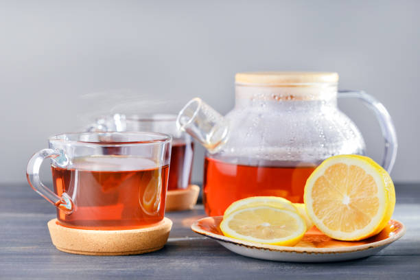 istock Time for tea, tea cups, teapot with hot tea and lemon 1201834434