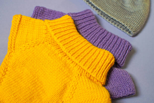 istock Woolen winter clothing. Top view sweater and hat. 1201835469
