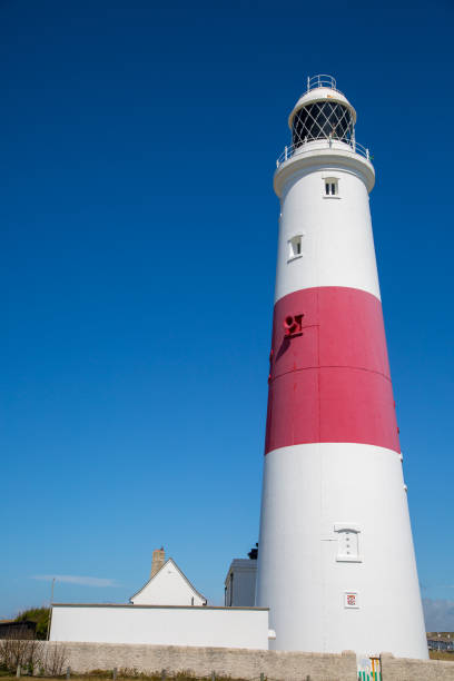 istock Red and white lighthouse. Portland Bill, Dorset, England 1201837098