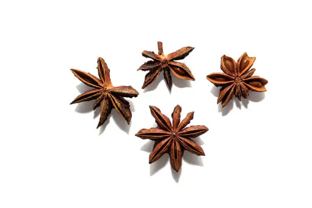 Fragrant anise isolated on a white background. Stars of dried flavorful anise isolated on a white background