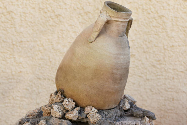 istock Old African clay jug on the stones 1201846818