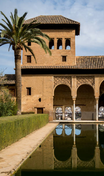 istock Pool in courtyard of Spanish building 1201846934