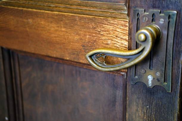 istock Antique ornamental door knocker, handle, hinge 1201847566