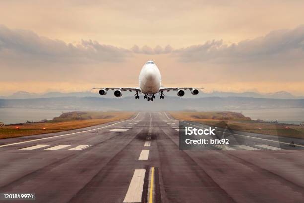 A Large Cargo Airplane Taking Off Stock Photo - Download Image Now - Airplane, Landing - Touching Down, Cargo Airplane