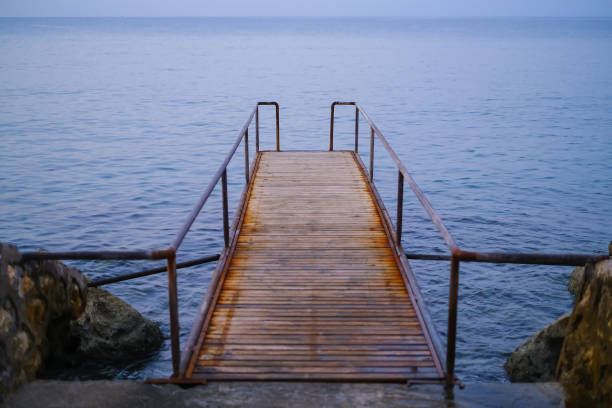 istock Pier in the Mediterranean sea 1201852523