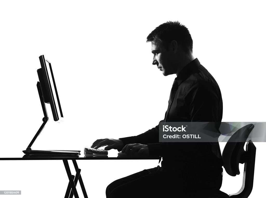 silhouette side view man computing computer serious silhouette one caucasian business side view man computing computer serious in studio   on white background Profile View Stock Photo