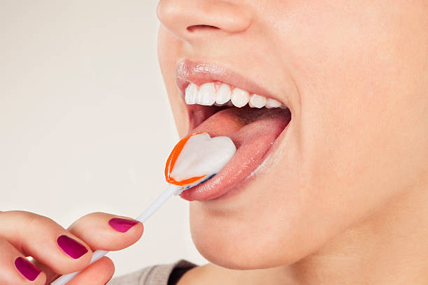 istock Young girl licking lollipop. 120185821