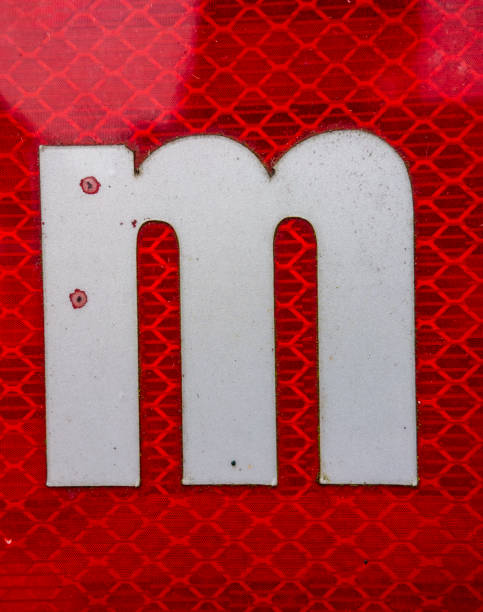 istock Written Wording in Distressed State Typography Found Letter M 1201858508