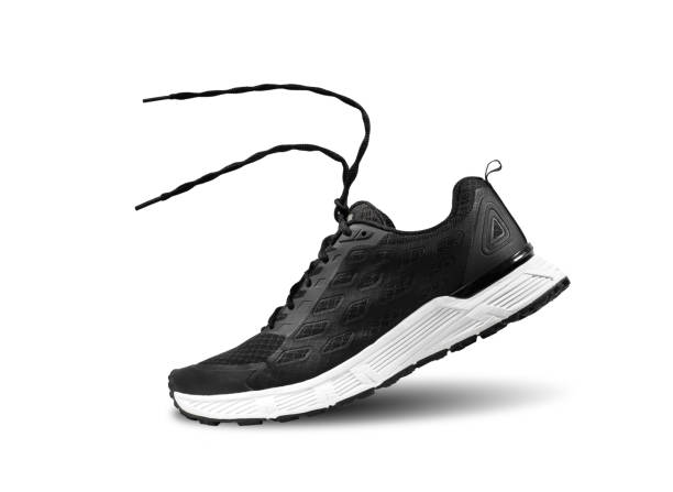 istock Black and white trail running shoes with moving rope isolated on white background , Left side 1201860786
