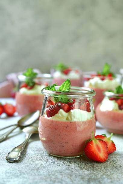 istock Delicious strawberry mousse or panna cotta with fresh berries 1201860945