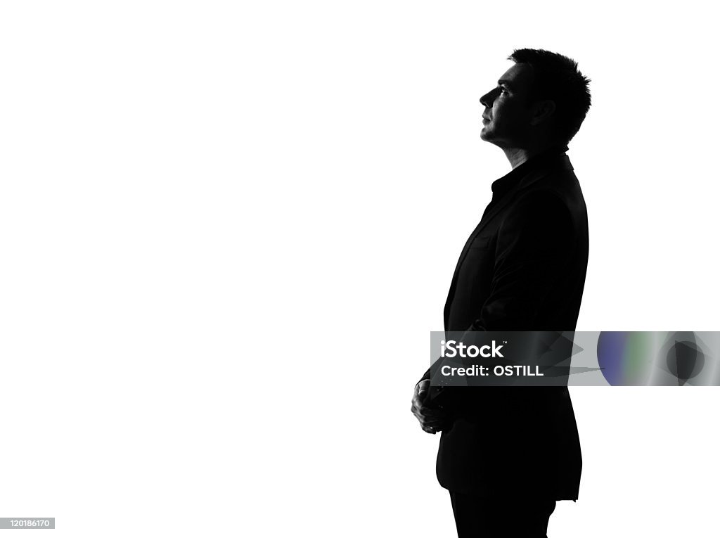 silhouette business man profile musing thinking serious looking up silhouette caucasian business man   profile serious looking up expressing behavior full length on studio isolated white background In Silhouette Stock Photo