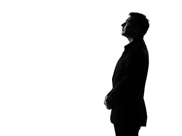 silhouette business man profile musing thinking serious looking up silhouette caucasian business man   profile serious looking up expressing behavior full length on studio isolated white background businessman photos stock pictures, royalty-free photos & images