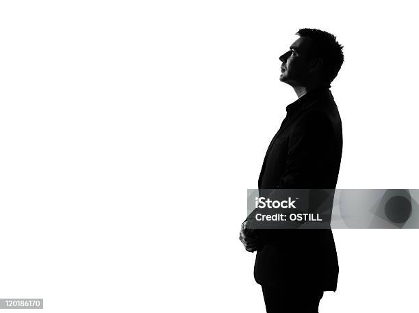 Silhouette Business Man Profile Musing Thinking Serious Looking Up Stock Photo - Download Image Now