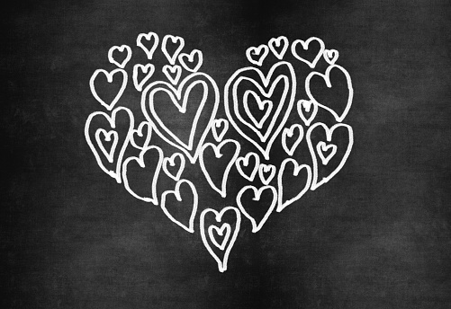 Love heart symbol on a blackboard