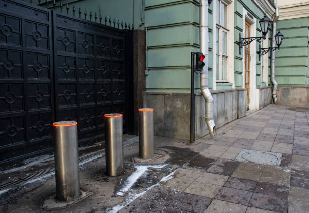 istock Metal automatic gates with traffic lights and automatic parking posts. 1201866562
