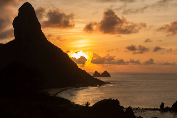istock Sunset over the sea and mountains 1201867132